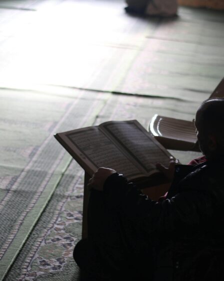 Man-Reading-Koran-in-a-Mosque