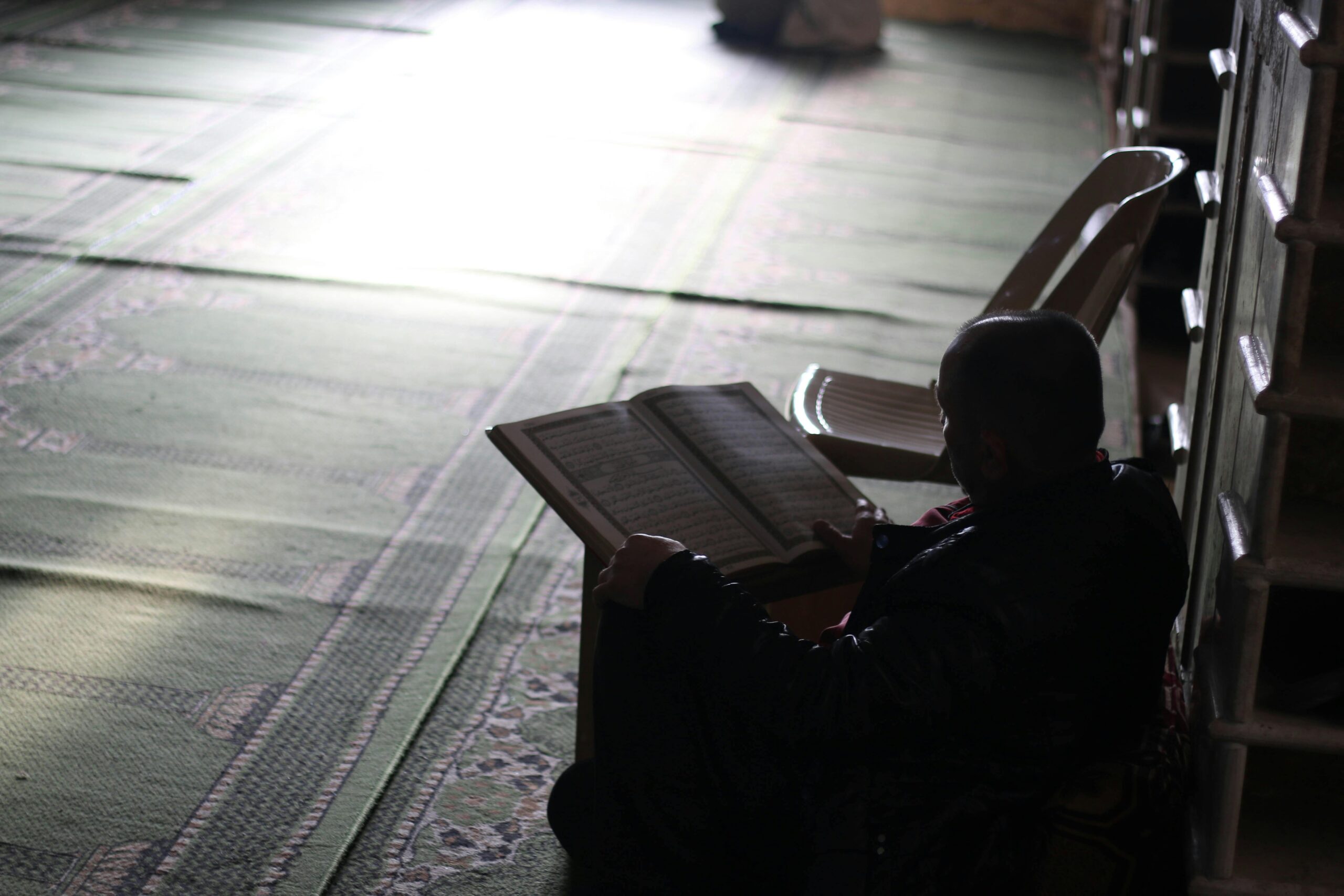 Man-Reading-Koran-in-a-Mosque