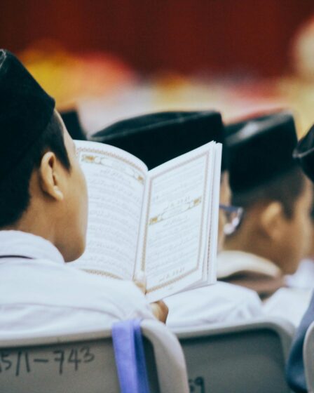 Photo-Of-Person-Reading-Quran